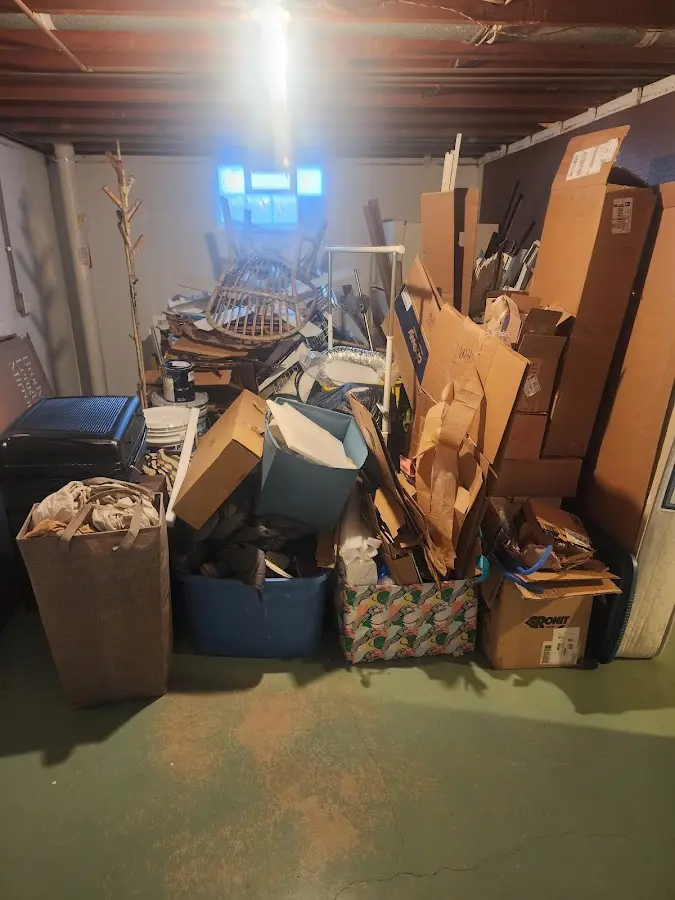 Roll-off dumpster container at job site for 20 Yard Dumpster Rental in Hernando